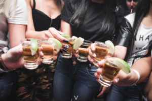 a group of people enjoying their drinks